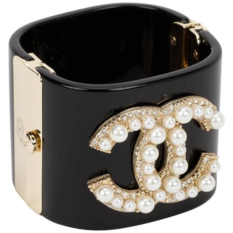 black white chanel cuff bracelet|chanel pearl bracelet with logo.